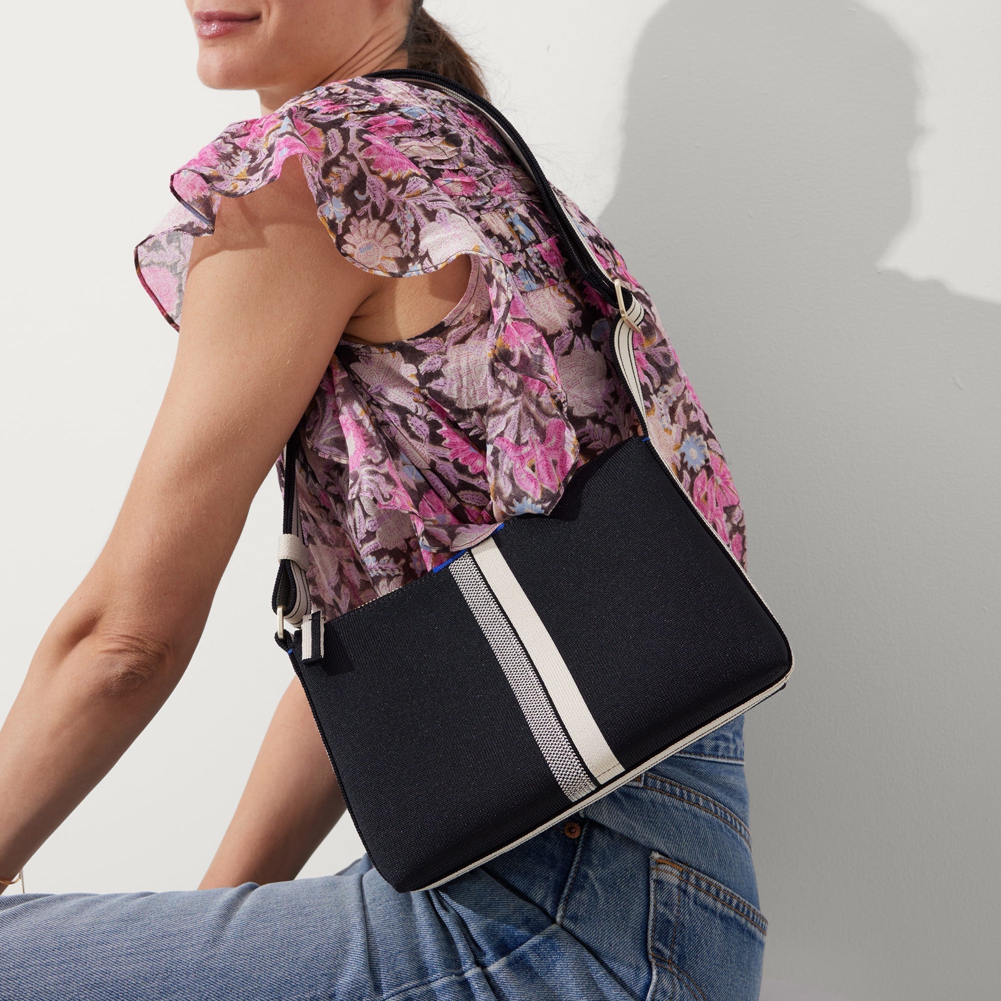 142_CasualCrossbody_Black_IvoryStripe_OnFigure_1430.jpg