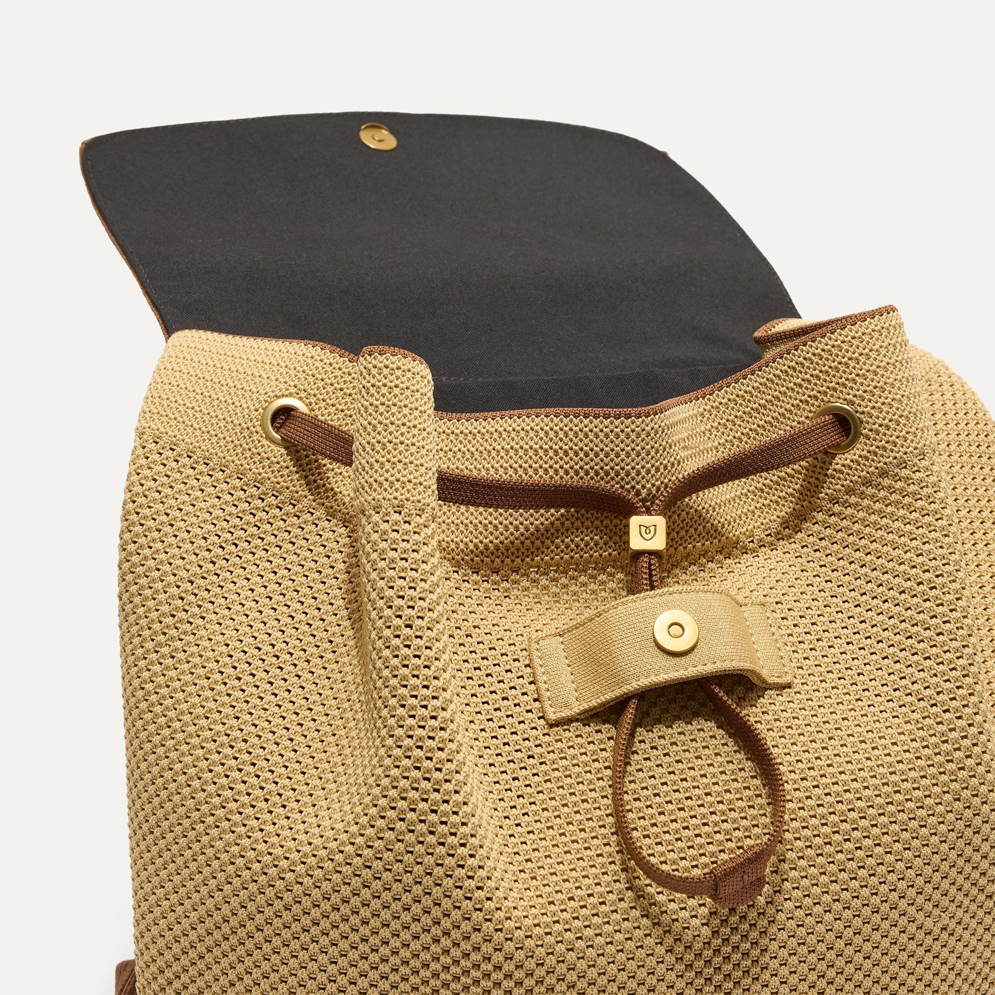 301_CinchBackpack_BrownButter_Front_strap_4434.jpg