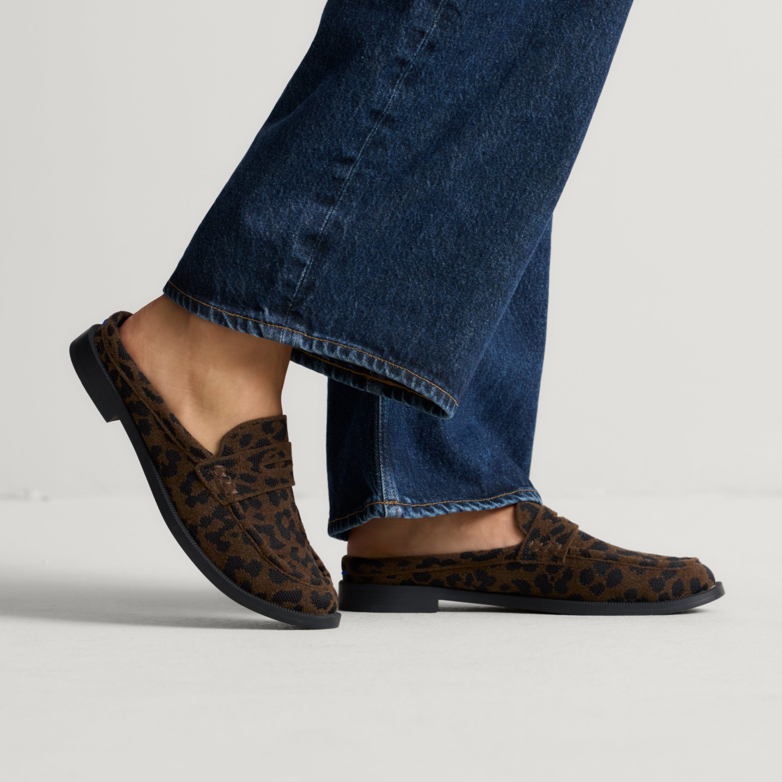 311_ReVelvetPennyLoaferMule_Cheetah_OnFigure_1098.jpg