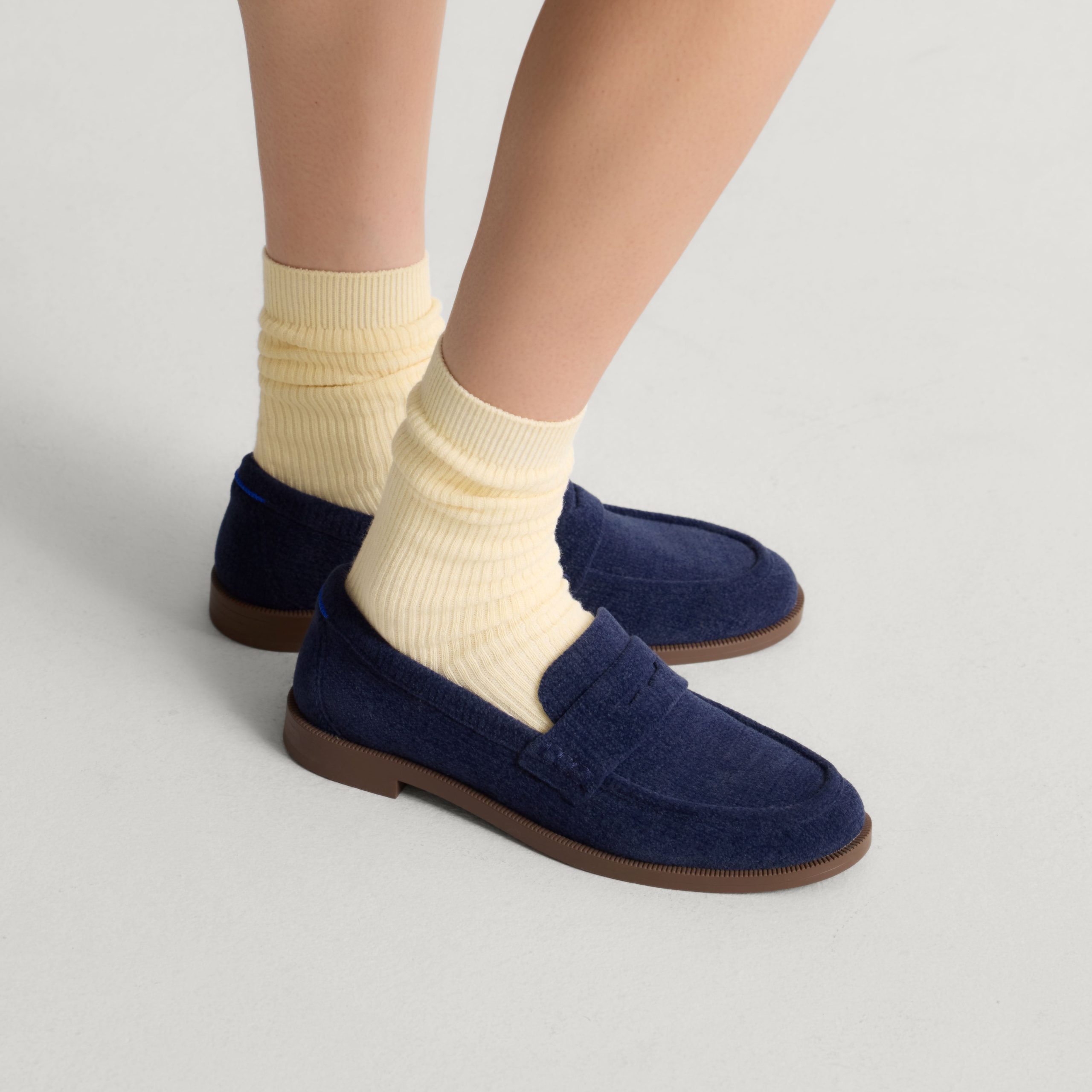 360_ReVelvetPennyLoafer_Navy_OnFigure_1190_pdp.jpg
