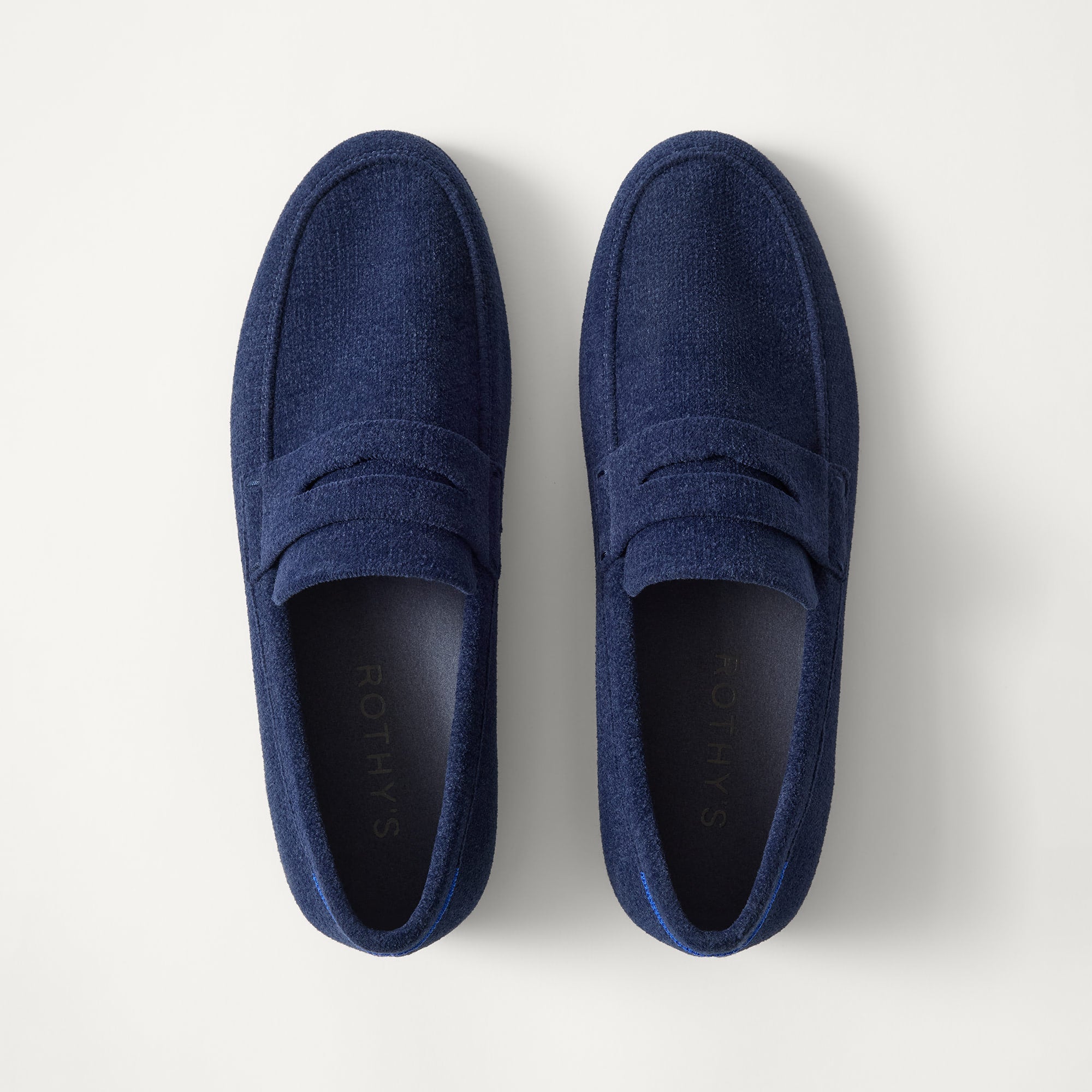 385_TheReVelvetRavelloPennyLoafer_DeepNavy_PrimaryOverhead_3443_1.jpg