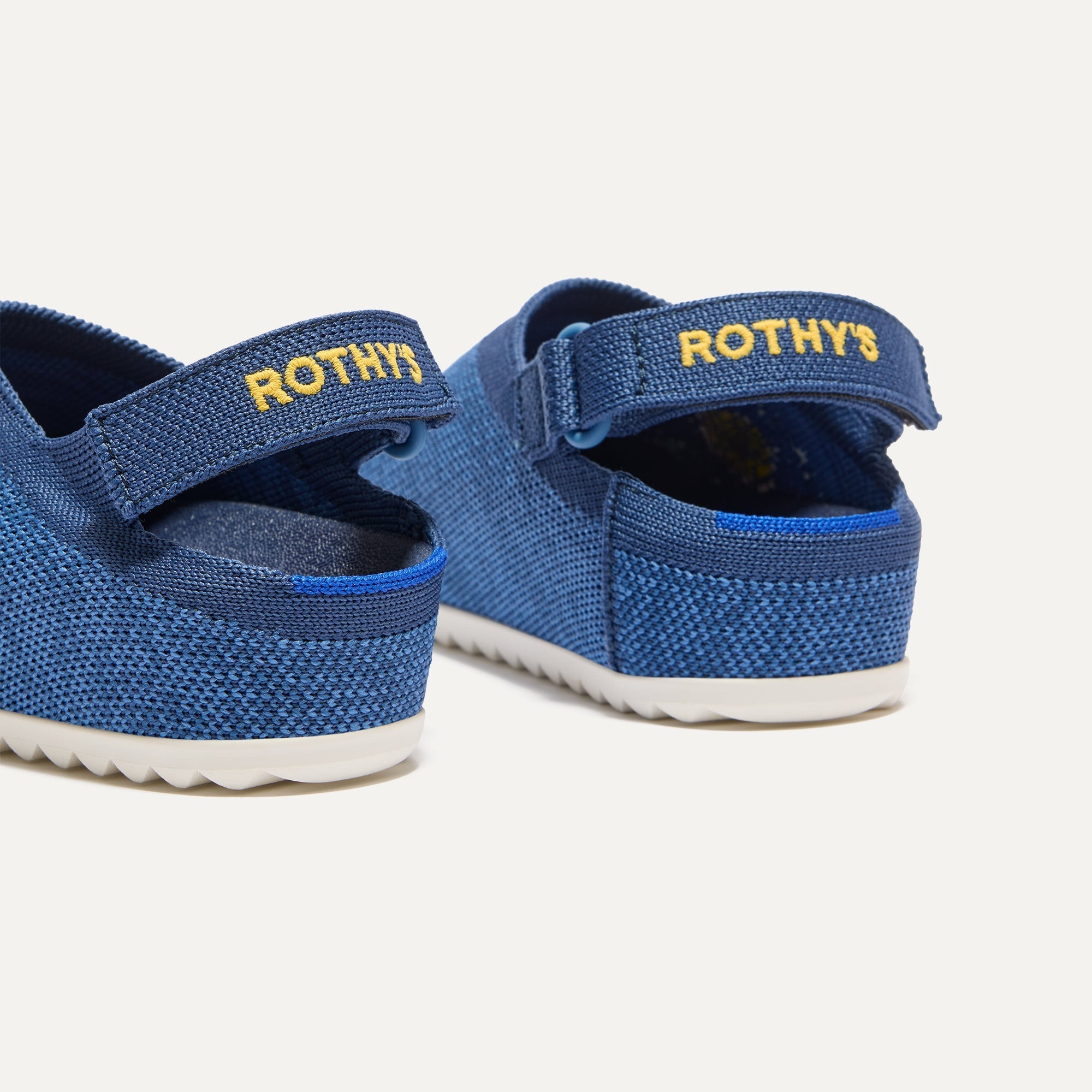 443_KidsClogU-TopLine_IndigoDaisy_Heel_6668.jpg